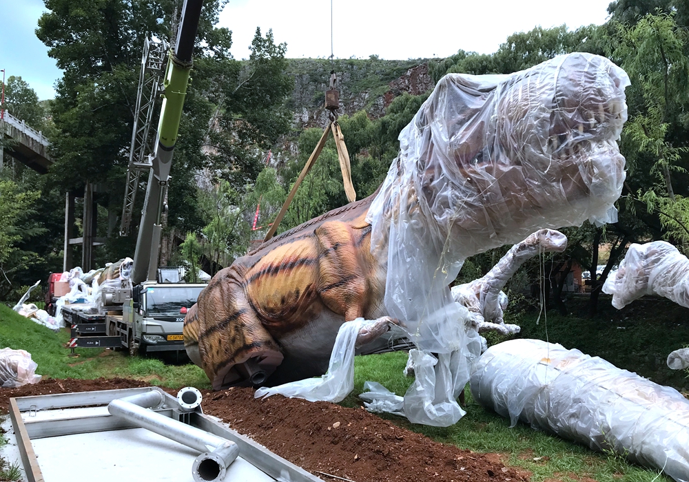 Animatronic dinosaurs before the protective materials are removed