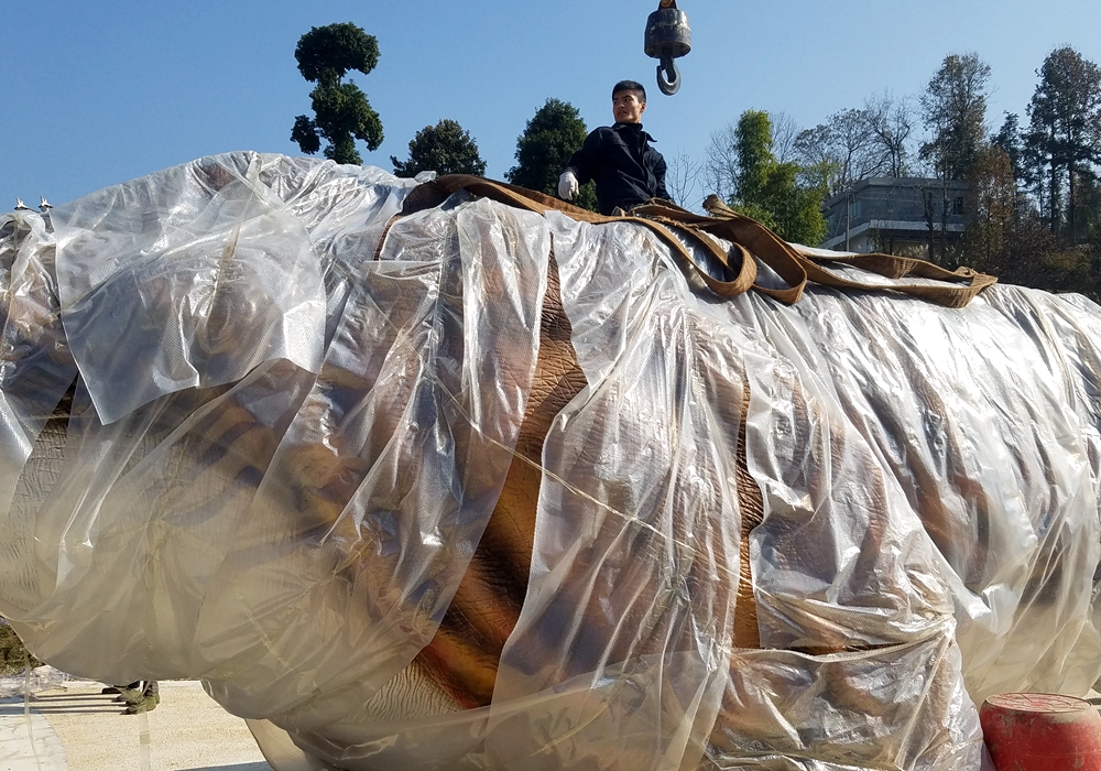 Animatronic dinosaurs wrapped in bubble wrap