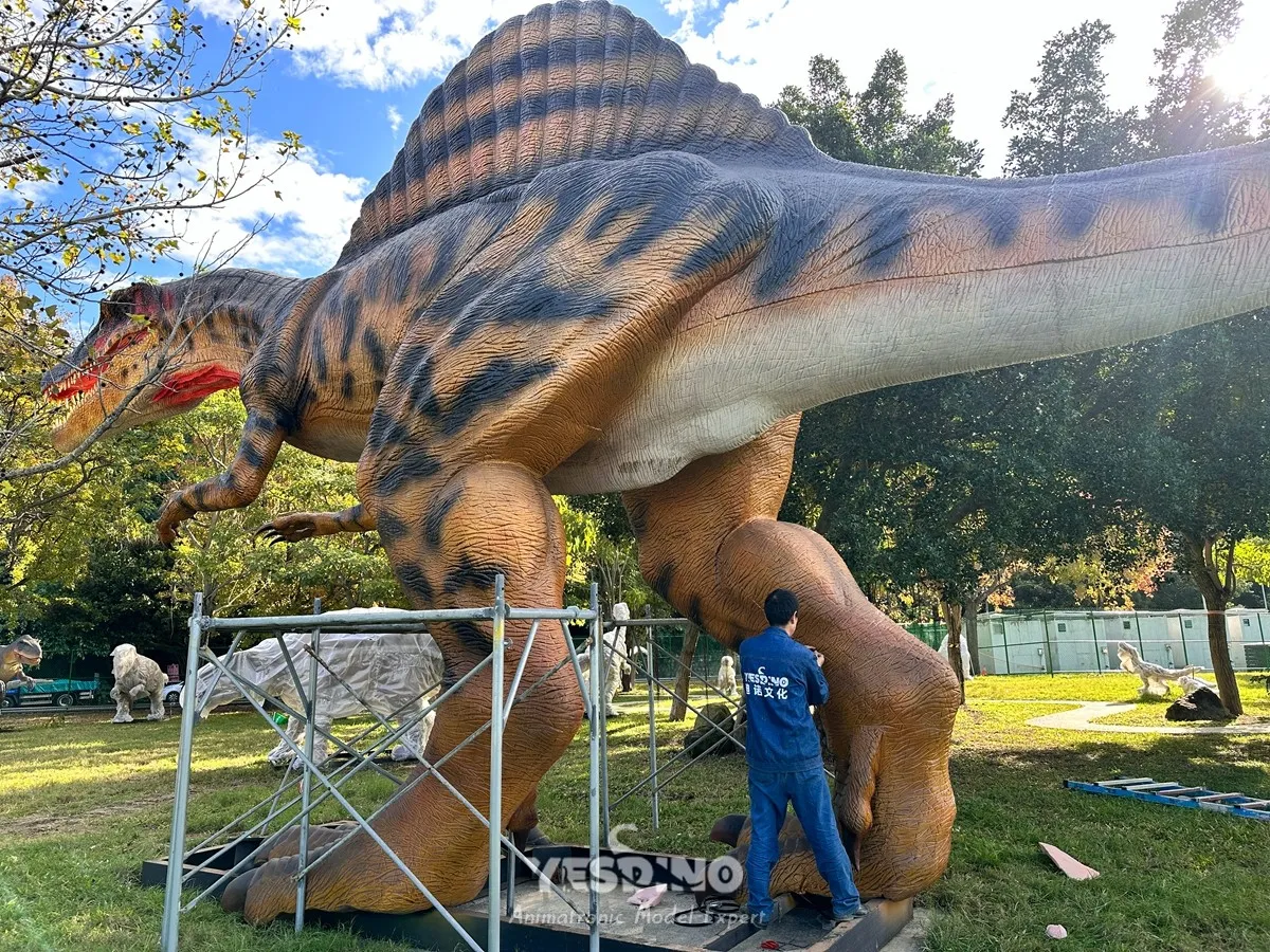 Stitching work on legs of 15‑meter animatronic Spinosaurus